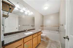 Master bath includes a jetted tub