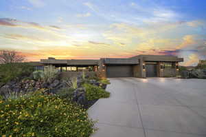 Contemporary home featuring a garage