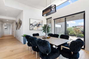 Dining room with light wood-type flooring