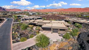 Birds eye view of property with a mountain view