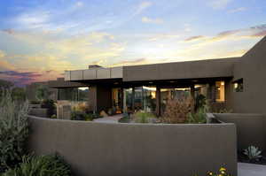 View of front of home with a patio area