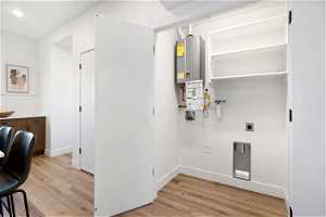 Tankless water heater and laundry
