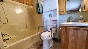 Full bathroom featuring shower / washtub combination, and vanity