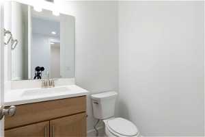 Bathroom with toilet and vanity
