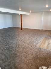 Basement with carpet