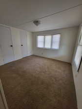 Empty room featuring carpet