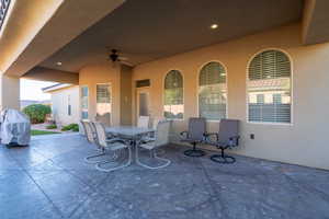 View of patio featuring ceiling fan