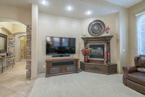 Living room featuring light colored carpet