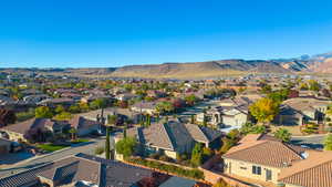 Drone / aerial view featuring a mountain view