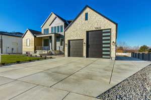 View of front of property featuring a front lawn