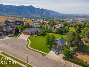 Birds eye view of property featuring a mountain view