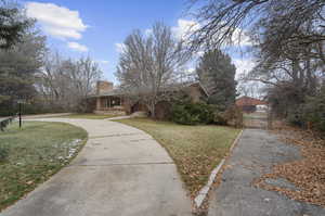 Front of Home-East to West with Side driveway towards barn