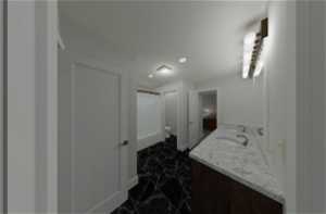 Jack & Jill Bathroom with double vanity, toilet, and tile flooring