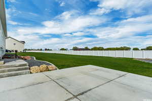 View of yard with a patio area