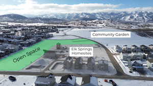 Snowy aerial view with a mountain view