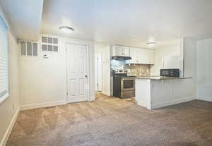 Spacious kitchen with laundry