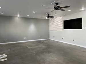 Unfurnished room featuring ceiling fan