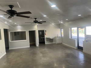 Spare room with ceiling fan and sink