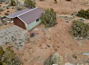 Aerial view, new metal roof and garage.