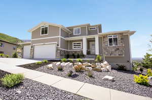 View of front facade with a garage