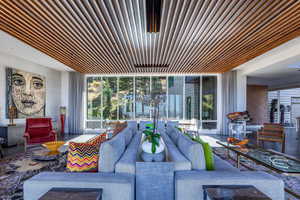 Living room with floor to ceiling windows