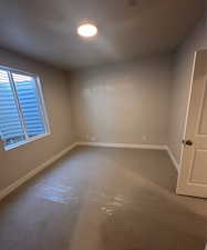 Spare room with carpet flooring