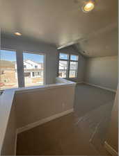 Upstairs loft with vaulted ceiling