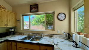 Kitchen featuring sink and plenty of natural light