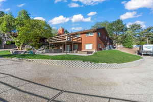 View of front of property featuring a front yard