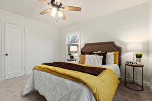 Bedroom featuring carpet floors and ceiling fan