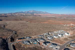 Birds eye view of property with a mountain view