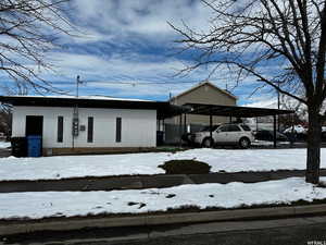 Exterior space with a carport