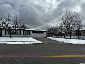 View of front of property with a garage