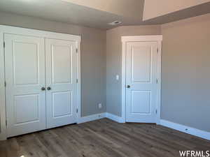 Interior space featuring dark hardwood / wood-style flooring