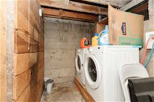 Clothes washing area with washer and clothes dryer