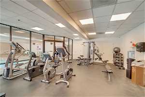 Exercise room with a paneled ceiling