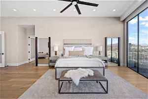 Bedroom with light wood-type flooring, access to exterior, and ceiling fan