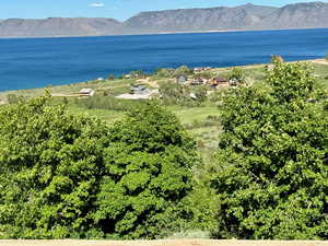 Property view of water with a mountain view