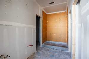 First level en-suite Primary Bathroom + walk-in closet
