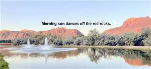 Morning sun dances of the red rocks.