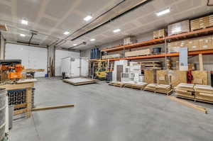 A 6,400-square-foot Shop/Barn is the perfect solution for fulfilling your diverse storage needs. Whether it's for your toys, vehicles, equipment, recreational items, or even animals, this expansive space offers ample room for all.