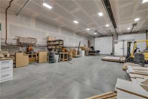 A 6,400-square-foot Shop/Barn is the perfect solution for fulfilling your diverse storage needs. Whether it's for your toys, vehicles, equipment, recreational items, or even animals, this expansive space offers ample room for all.