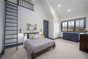 Bedroom featuring high vaulted ceiling and light carpet