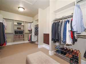 Huge Primary Suite walk-in closet, with pass through to laundry room