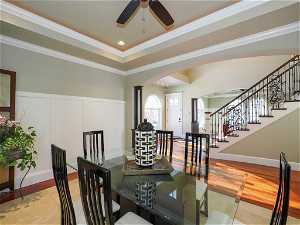 Formal dining room with entry foyer in background