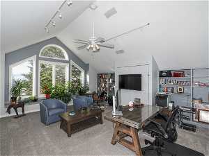 Huge second floor office with wet bar, vaulted ceilings and large southern exposure windows