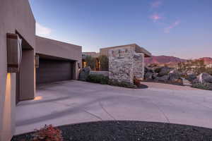 Exterior space featuring a garage and a mountain view