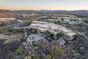 Aerial view at dusk featuring a mountain view