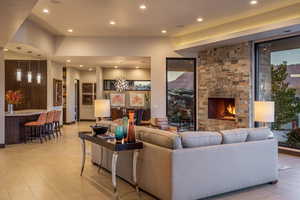 Tiled living room with a fireplace