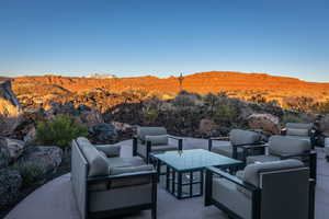 View of patio featuring outdoor lounge area and a mountain view